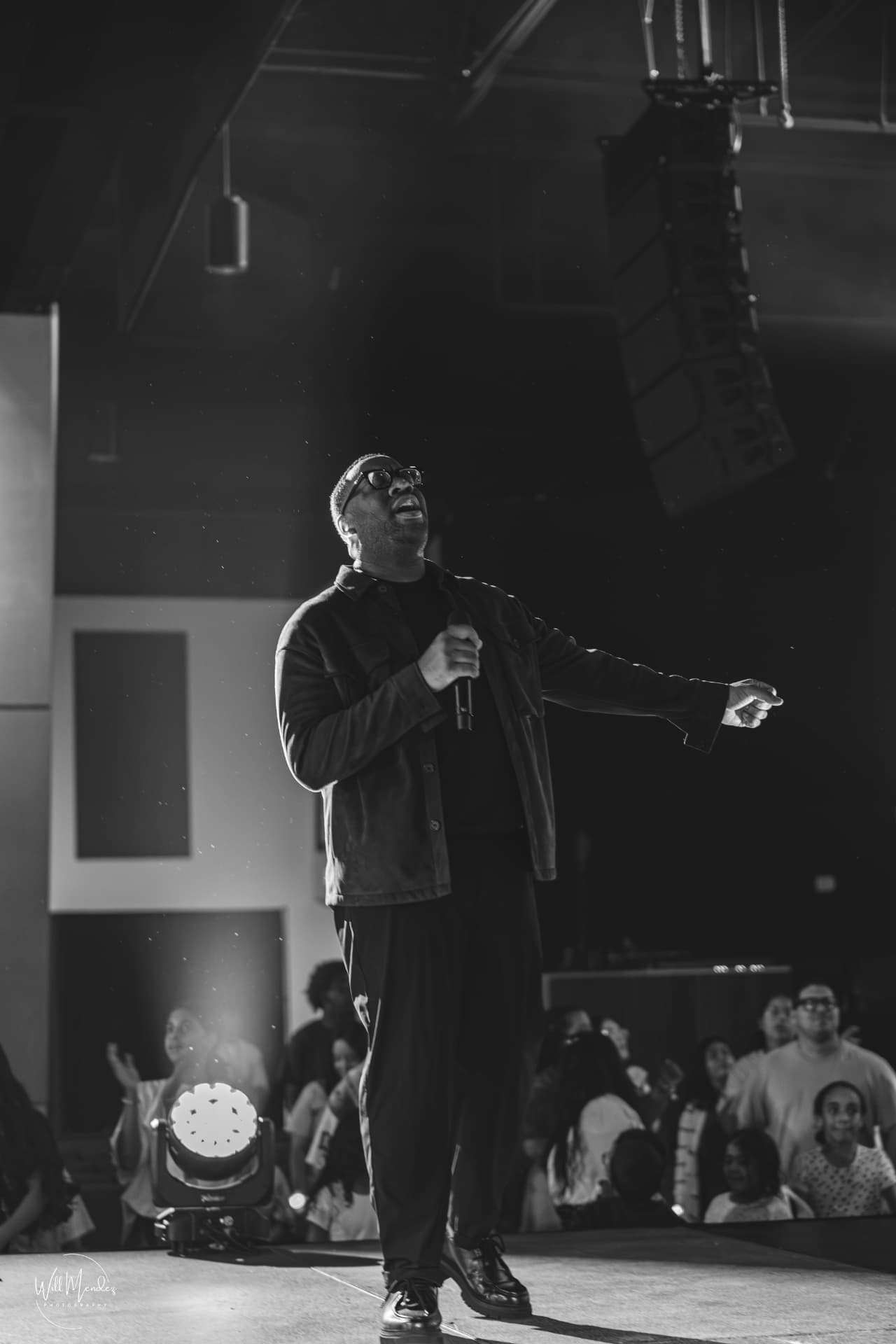 EJ LaTouche singing with the audience in view