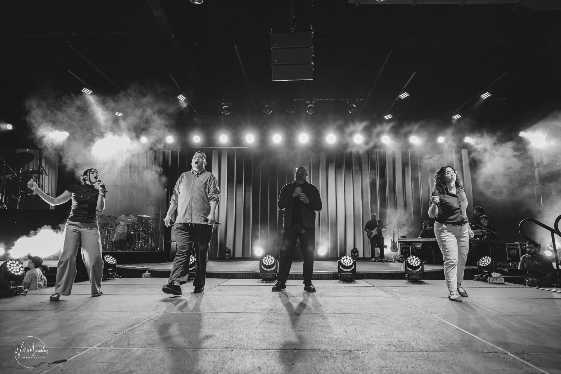 Worship team performing together onstage